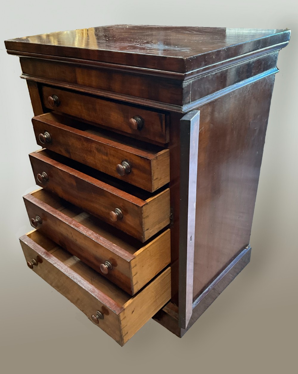An unusual small Victorian mahogany wellington chest. c1860. 