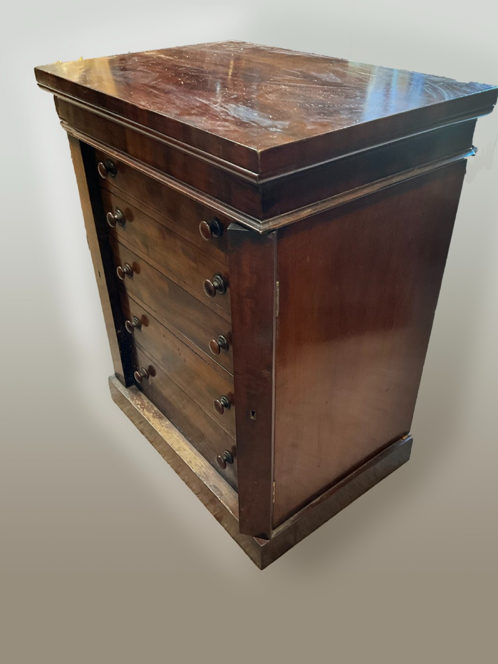 An unusual small Victorian mahogany wellington chest. c1860.  View II