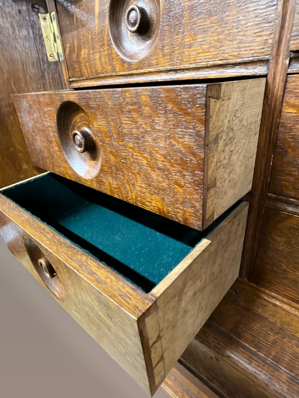 A small two door oak cabinet. Circa 1900.  View III