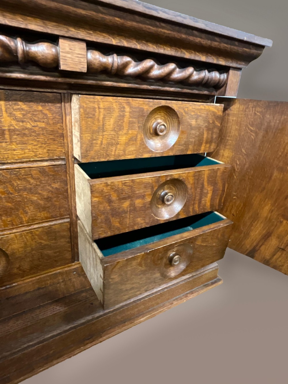 A small two door oak cabinet. Circa 1900.  View IV