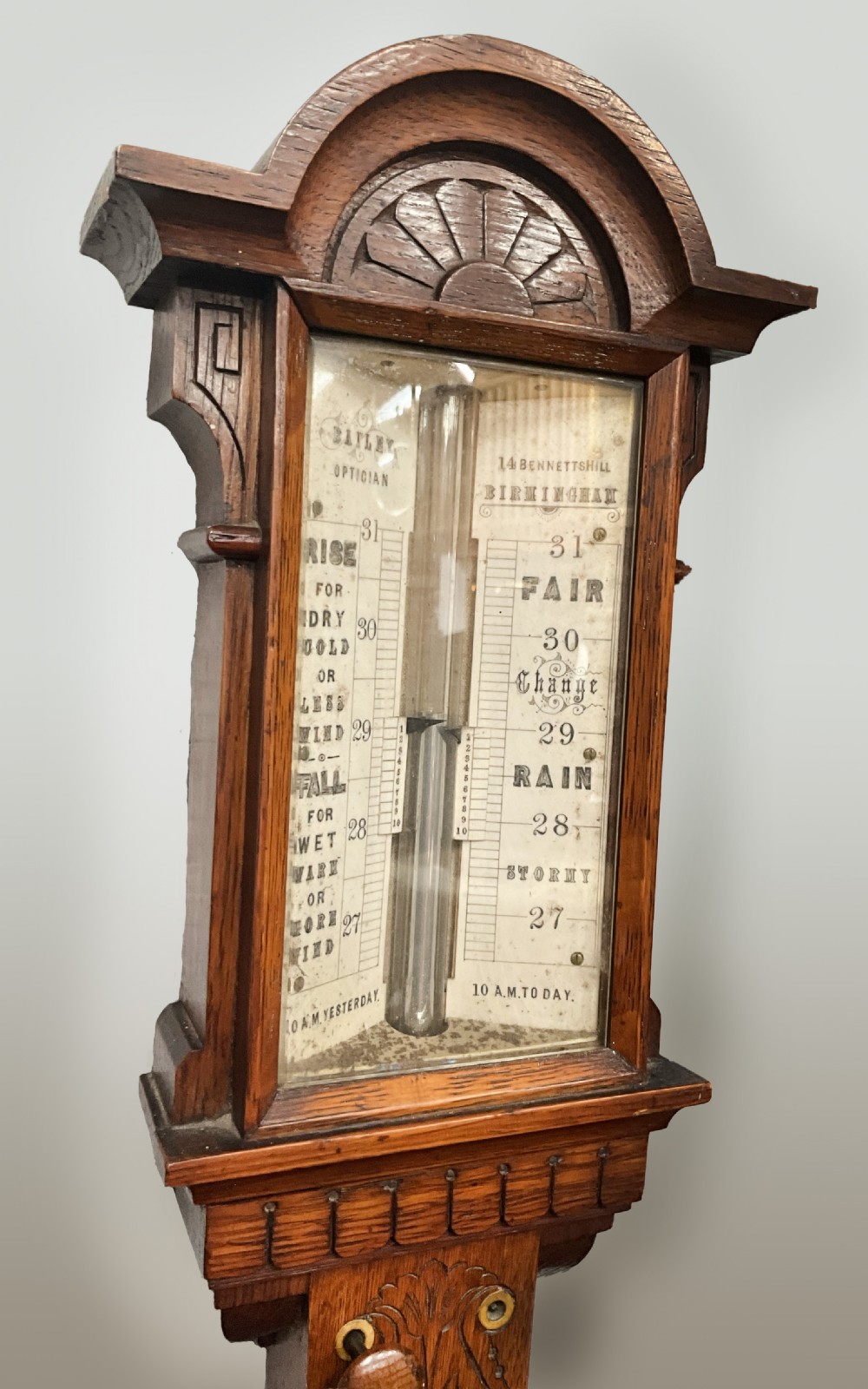 A 19th century Birmingham oak stick barometer and thermometer. View III