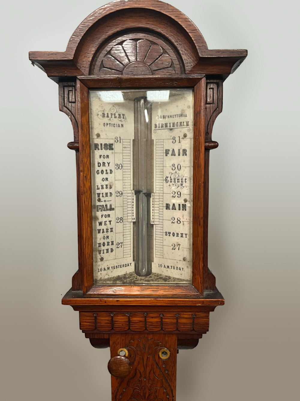 A 19th century Birmingham oak stick barometer and thermometer. View IV