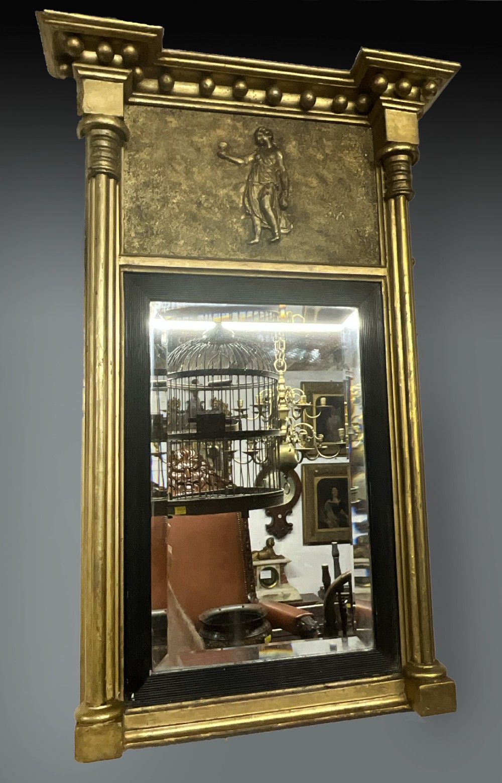A small early 19th century gilt pier mirror. Circa 1820.