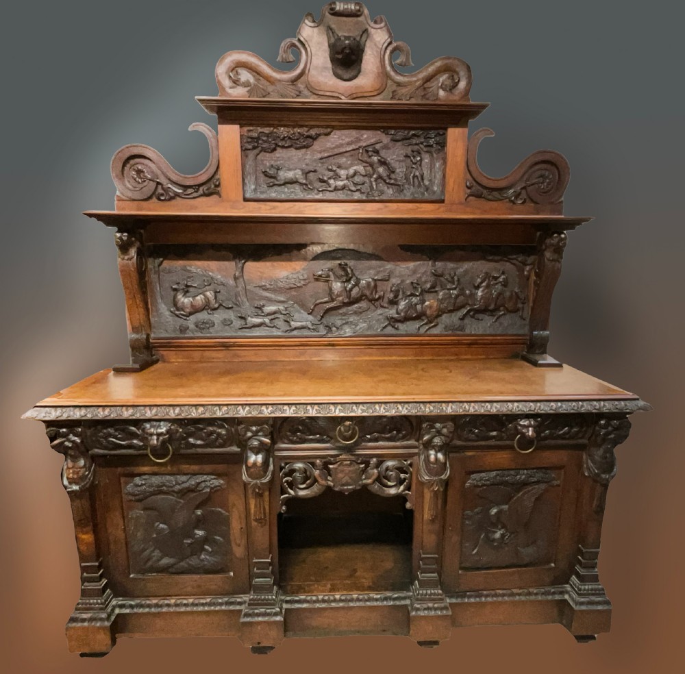 A large carved English oak sideboard. Circa 1860
