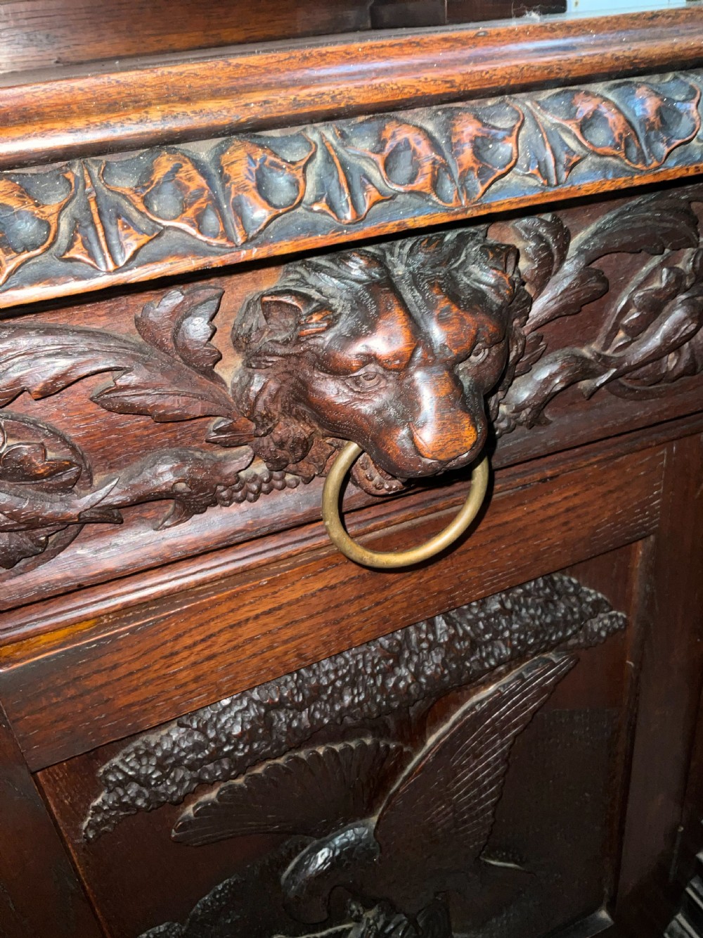 A large carved English oak sideboard. Circa 1860 View II