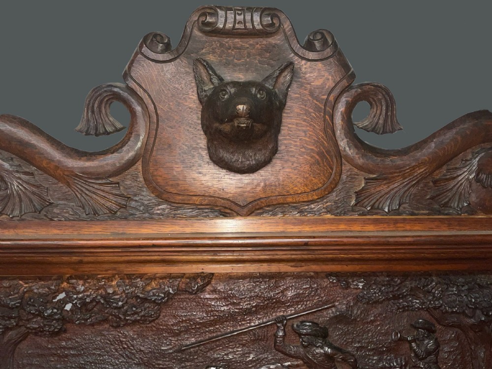 A large carved English oak sideboard. Circa 1860 View III