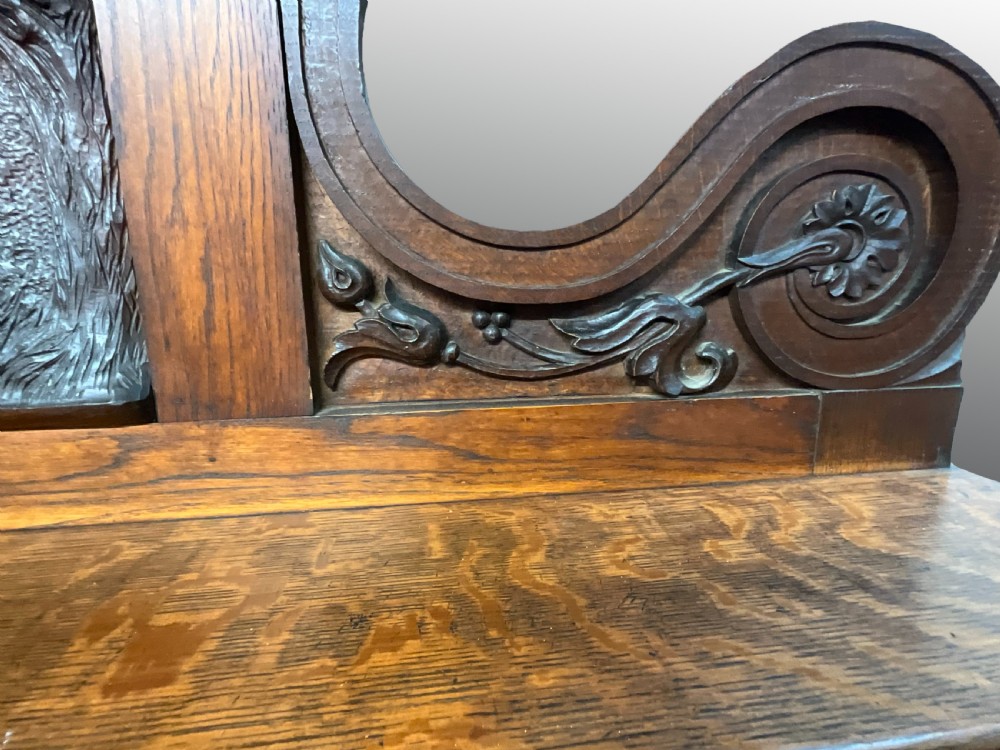 A large carved English oak sideboard. Circa 1860 View V