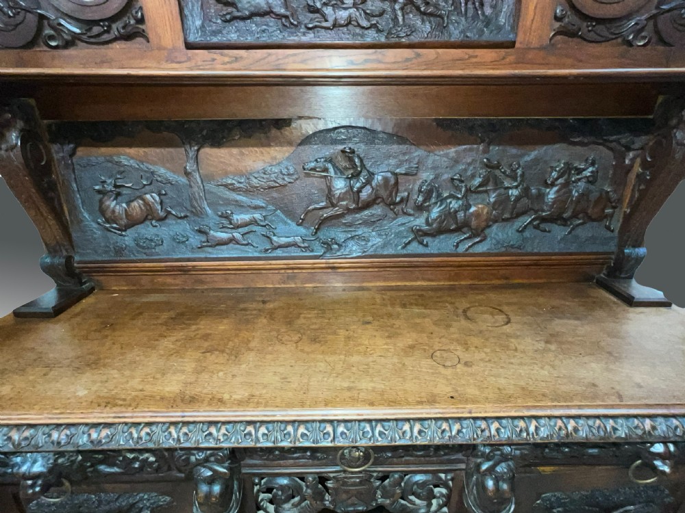 A large carved English oak sideboard. Circa 1860 View VIII