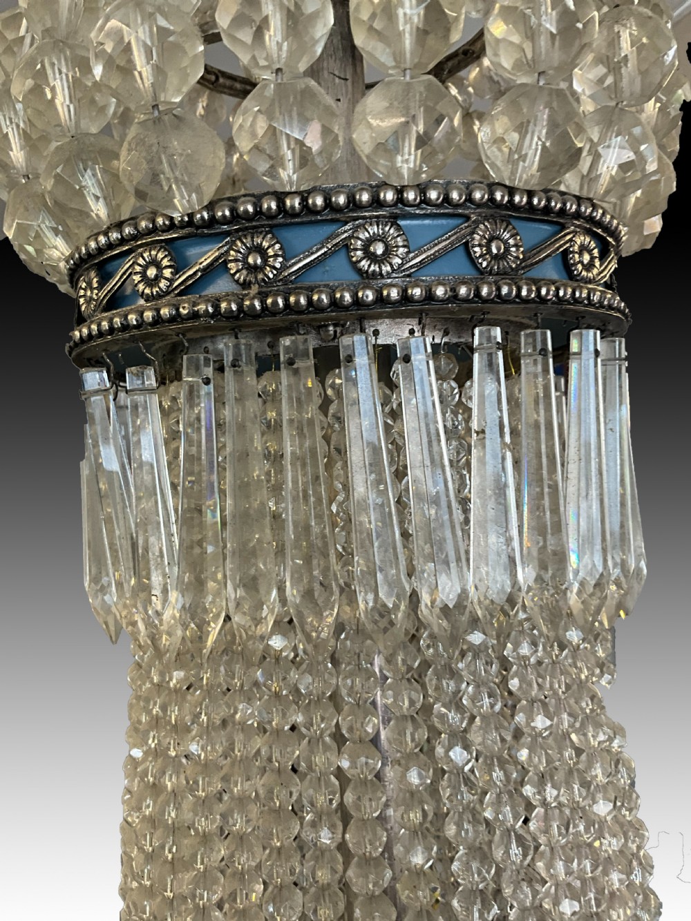 An antique crystal tent and bag chandelier featuring silvered metal bands inset with oval blue Wedgwood jasperware cameo plaques. View IV