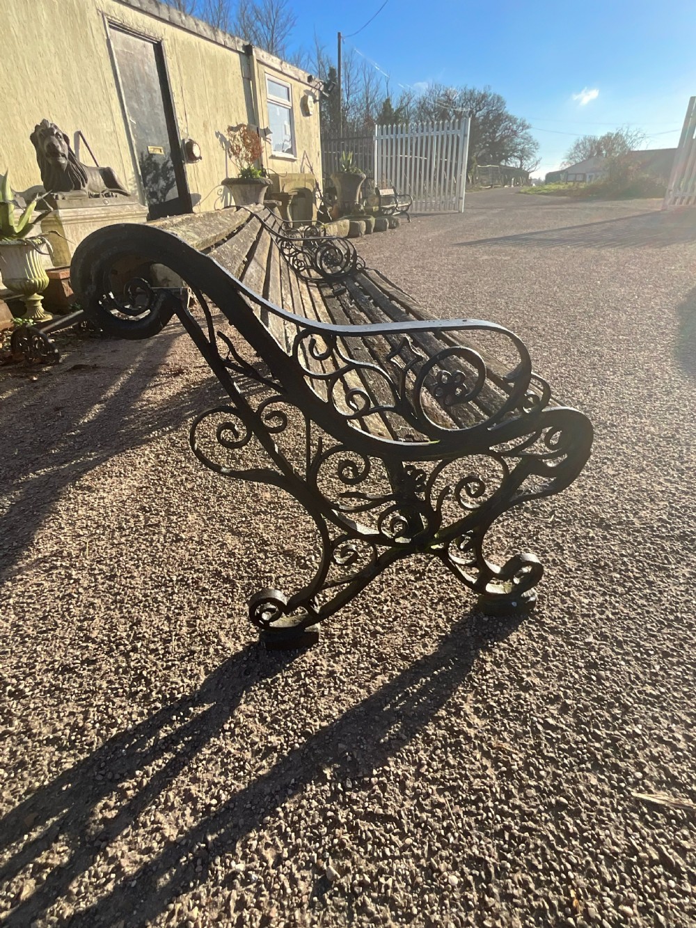 A pair of early 20th century garden benches. View IV