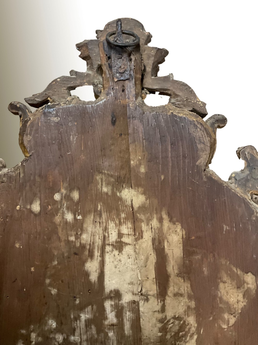 An 18th century continental gilt wood wall mirror View III