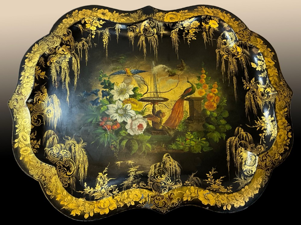 A mid Victorian japanned and hand painted tin tray.