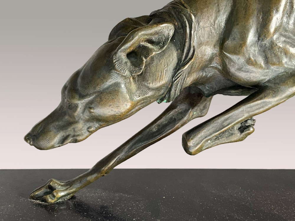 A large Bronze greyhound on marble base. View II