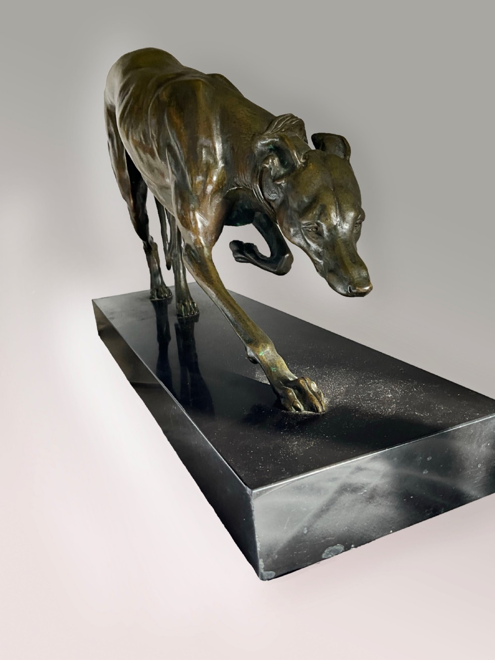 A large Bronze greyhound on marble base. View III