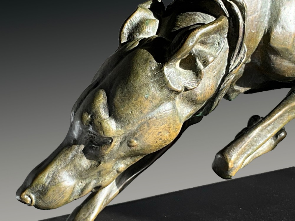A large Bronze greyhound on marble base. View VII