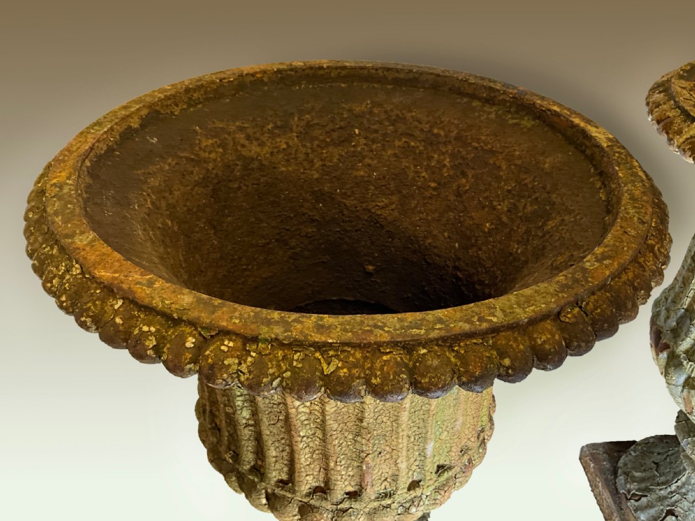 An extremely attractive pair of heavy cast iron garden urns. View VI