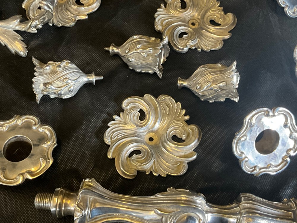 A High Quality Pair of Silver Plated Four Flame Candelabra's. Marked HV.  View XII