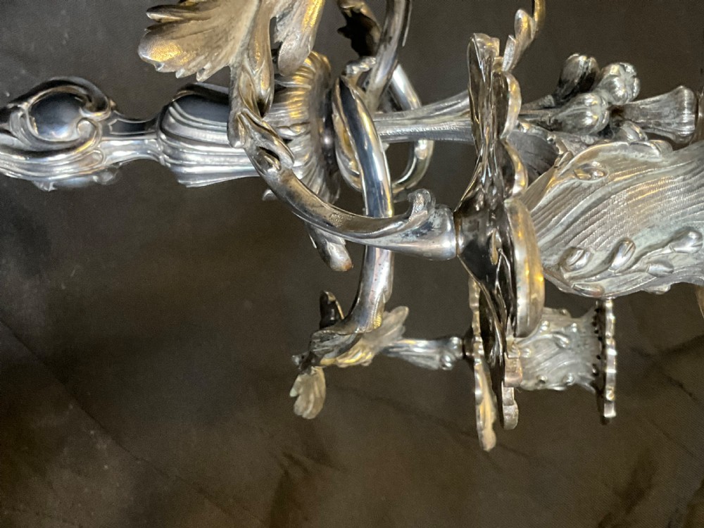 A High Quality Pair of Silver Plated Four Flame Candelabra's. Marked HV.  View XV