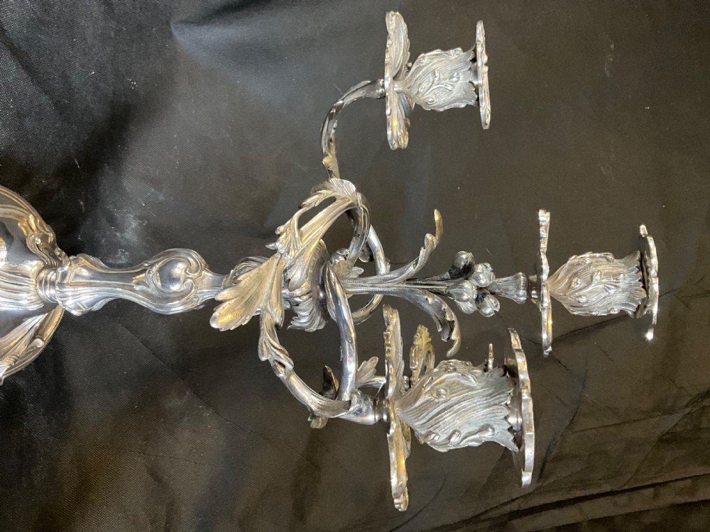A High Quality Pair of Silver Plated Four Flame Candelabra's. Marked HV.  View XVII
