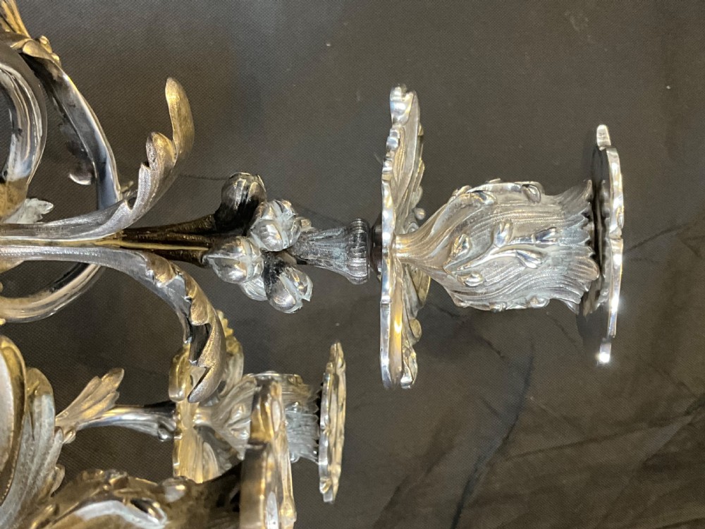 A High Quality Pair of Silver Plated Four Flame Candelabra's. Marked HV.  View XVIII