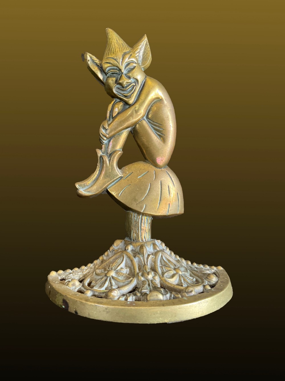 A Brass Weighted Pixie Door Stop