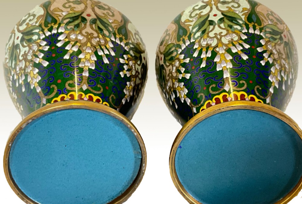A delightfully decorative pair of Cloisonné vases on wooden bases View V