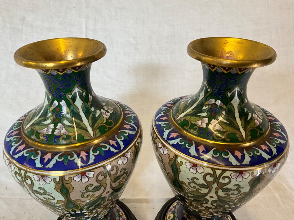 A delightfully decorative pair of Cloisonné vases on wooden bases View IX