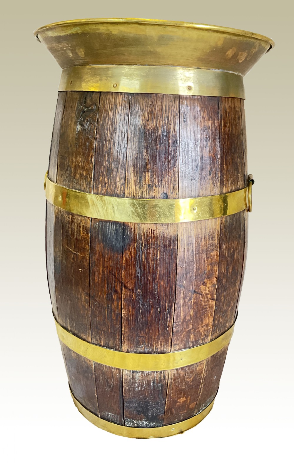 An Oak and Brass Barrel Stick Stand