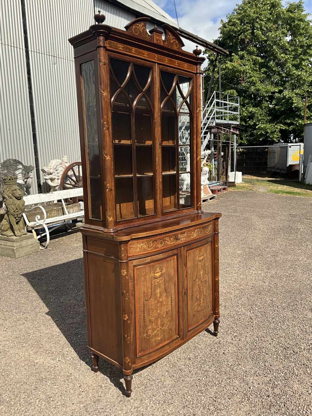 An attractive and fine quality marquetry and mahogany glazed top bookcase. Circa 1880.  View XIII