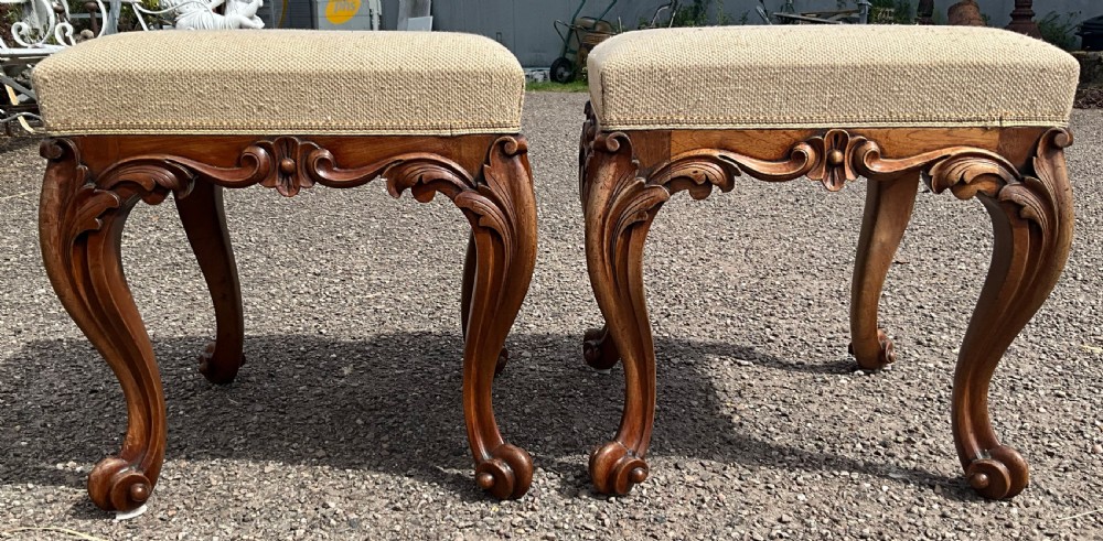 Offered for sale is this good looking pair of walnut upholstered stools. Circa 1860.