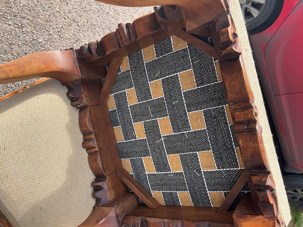 Offered for sale is this good looking pair of walnut upholstered stools. Circa 1860. View III