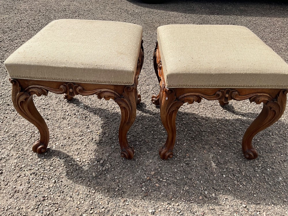 Offered for sale is this good looking pair of walnut upholstered stools. Circa 1860. View V