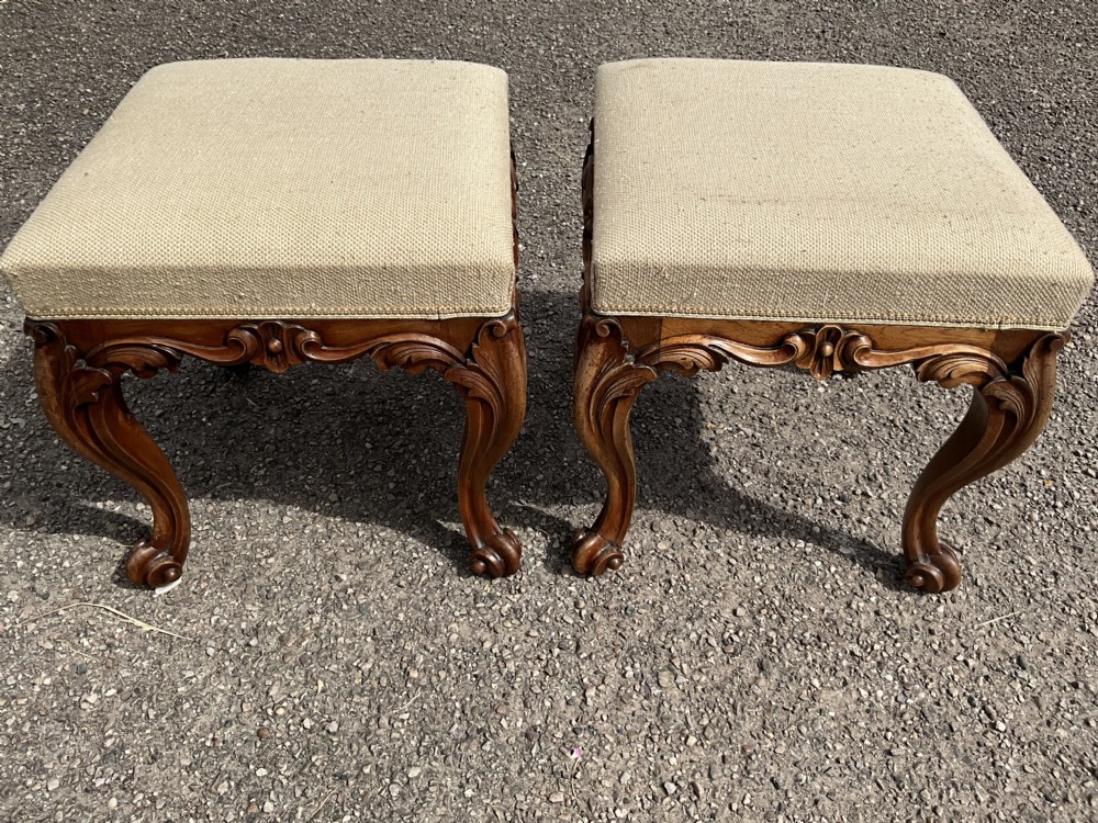 Offered for sale is this good looking pair of walnut upholstered stools. Circa 1860. View VI