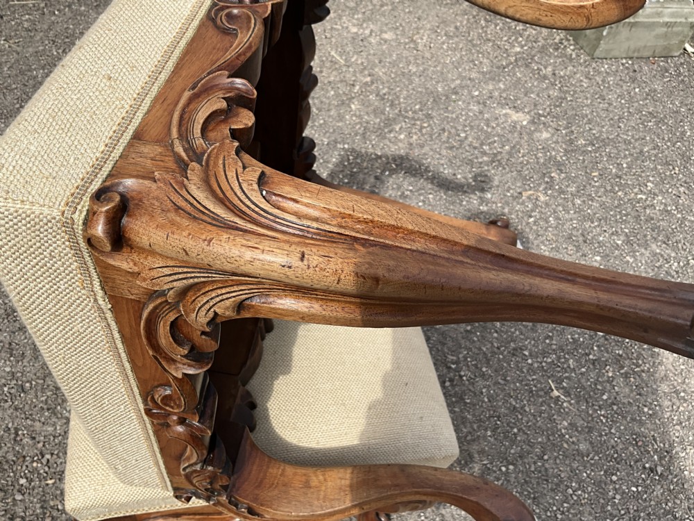 Offered for sale is this good looking pair of walnut upholstered stools. Circa 1860. View VII