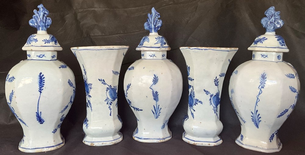 A set of five 18th century blue and white Delft garniture with original lids. Circa 1780.  View II