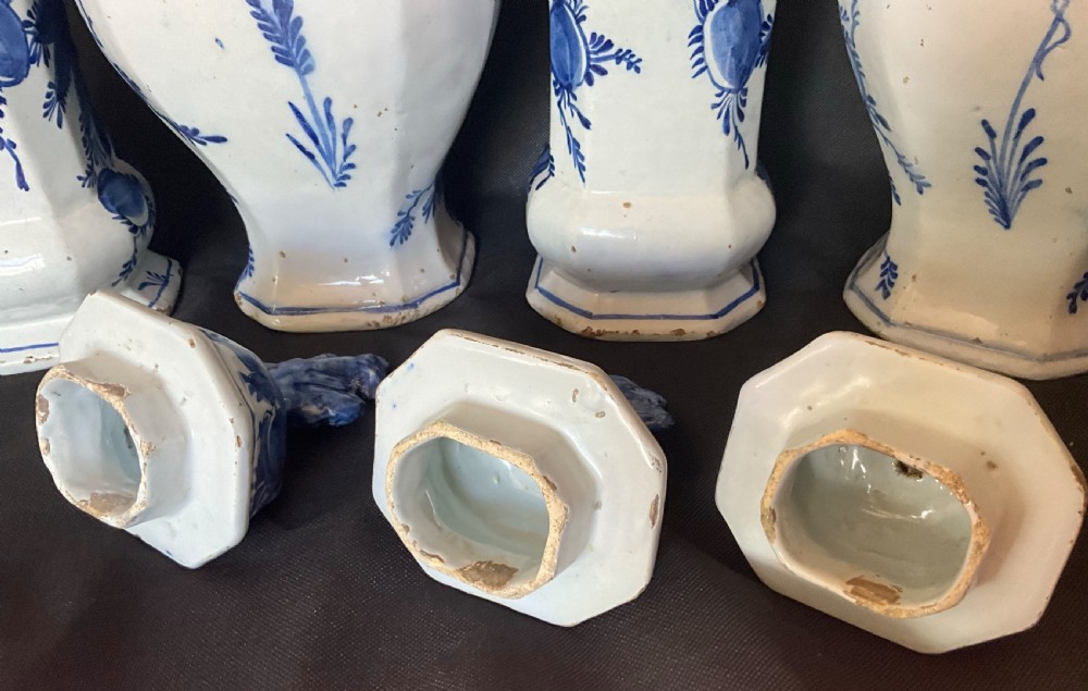 A set of five 18th century blue and white Delft garniture with original lids. Circa 1780.  View III
