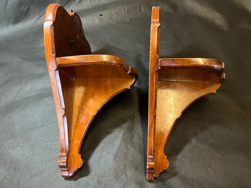 A pair of solid mahogany wall brackets View III