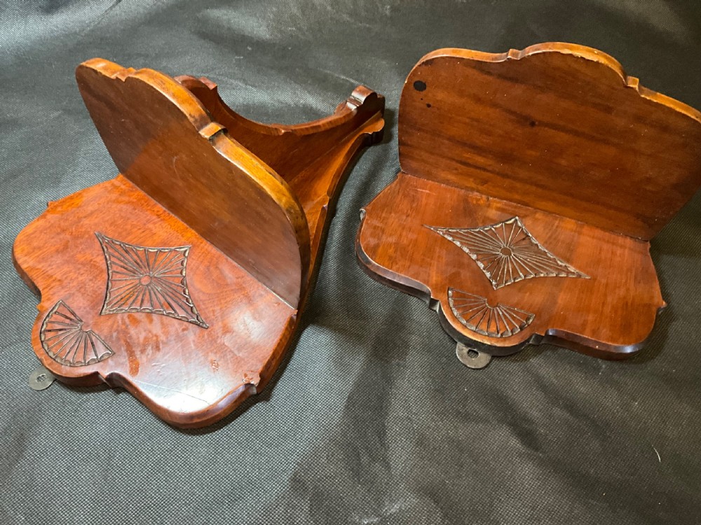 A pair of solid mahogany wall brackets View VIII