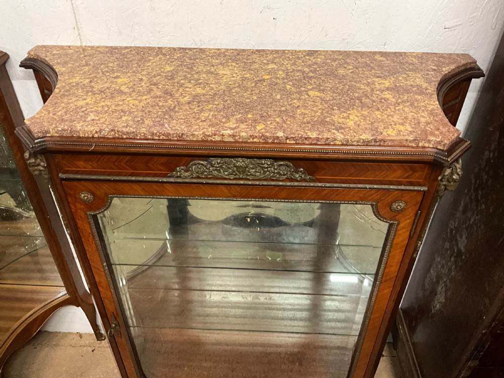 A pair of French marble topped kingwood display cabinets. View III