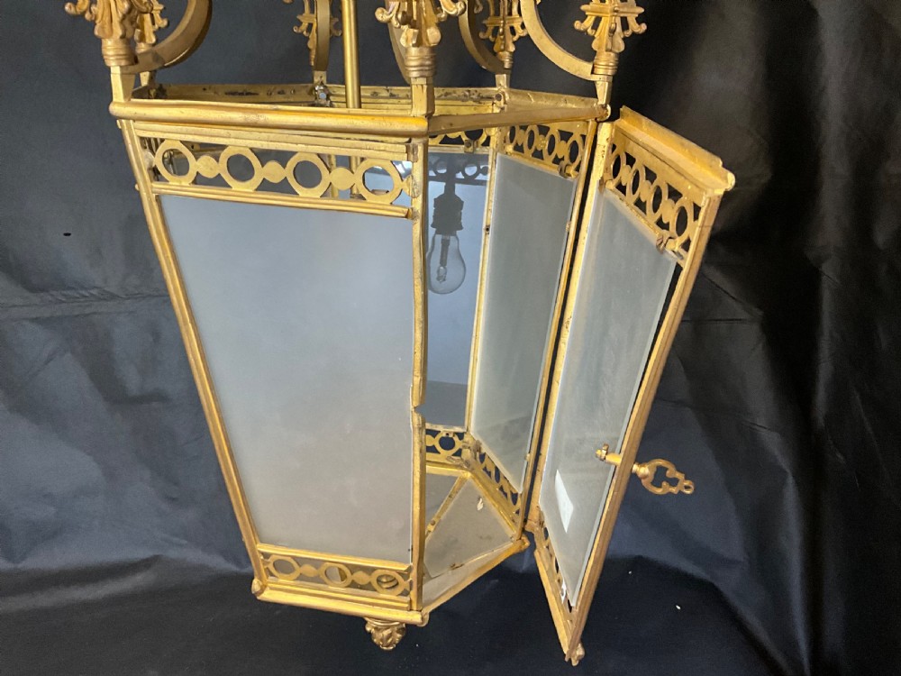 A French brass hall lantern with six opaque glass sides c1900. View V