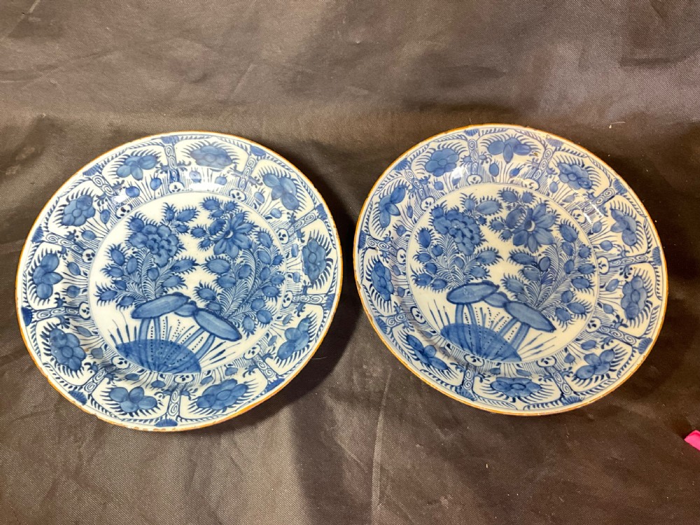 A Pair Of 18th Century Blue And White Delft Plates