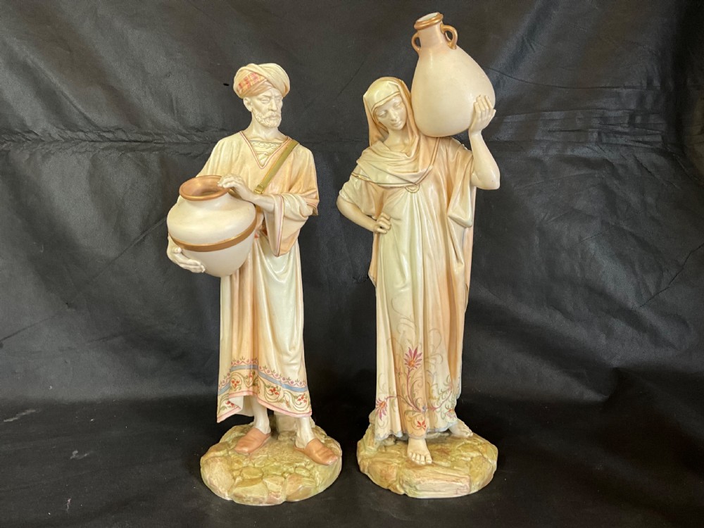 A spectacular large pair of Worcester figures the water carriers