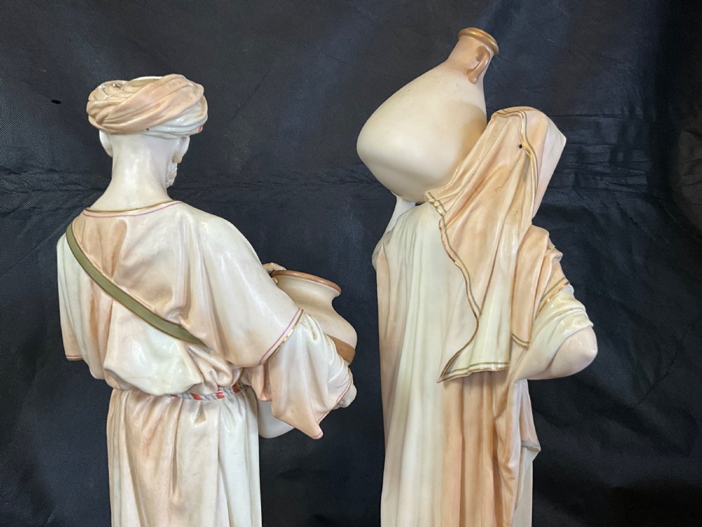 A spectacular large pair of Worcester figures the water carriers View VIII