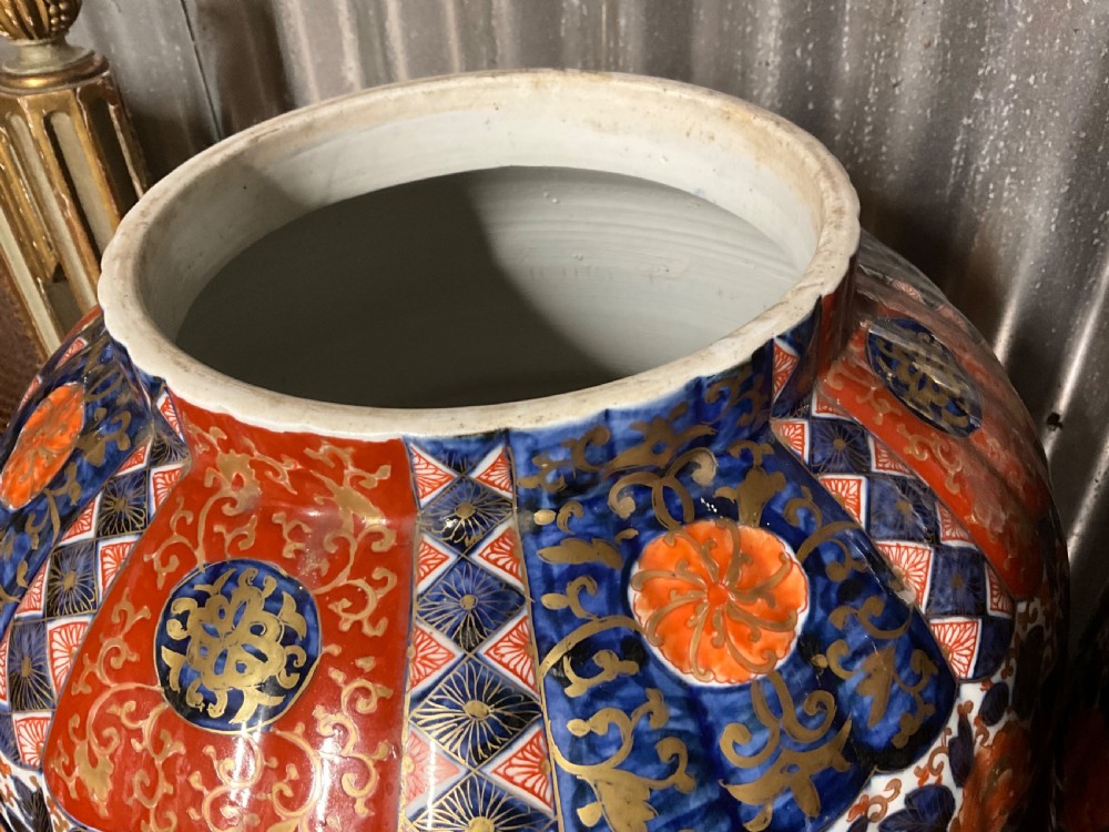 An impressively large pair of Imari lidded vases.  View IV