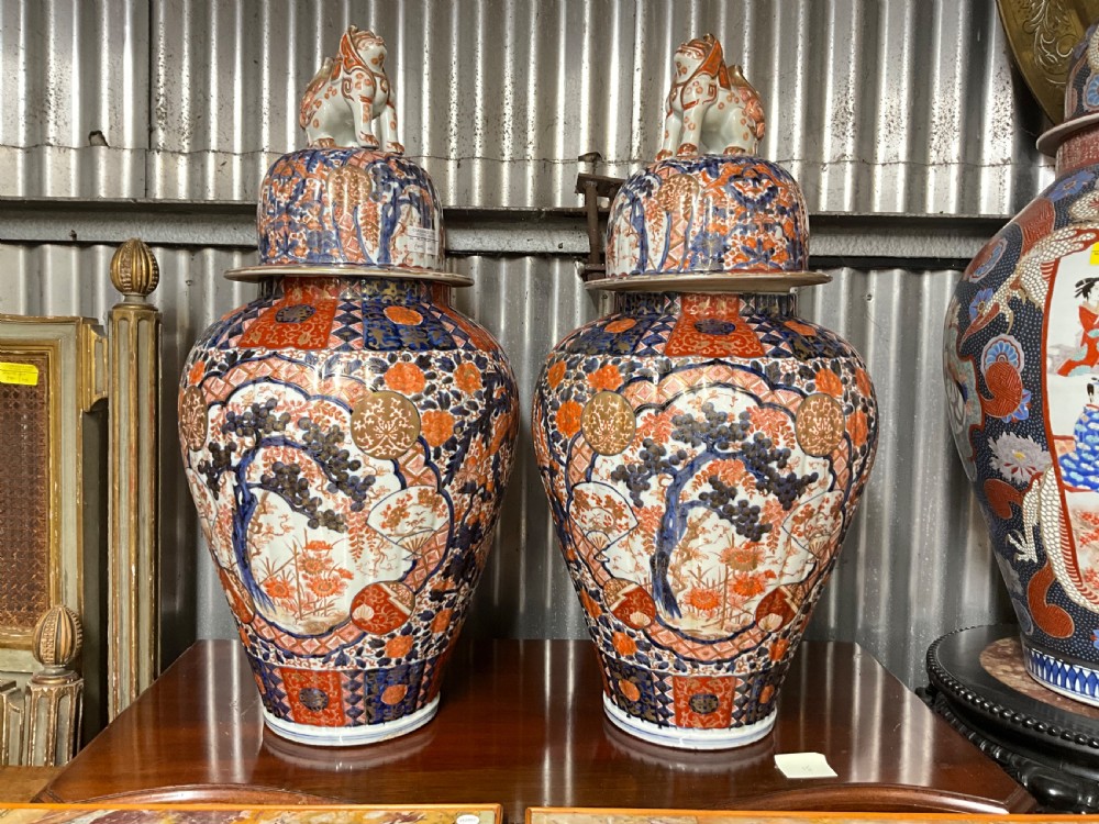 An impressively large pair of Imari lidded vases.  View XIII