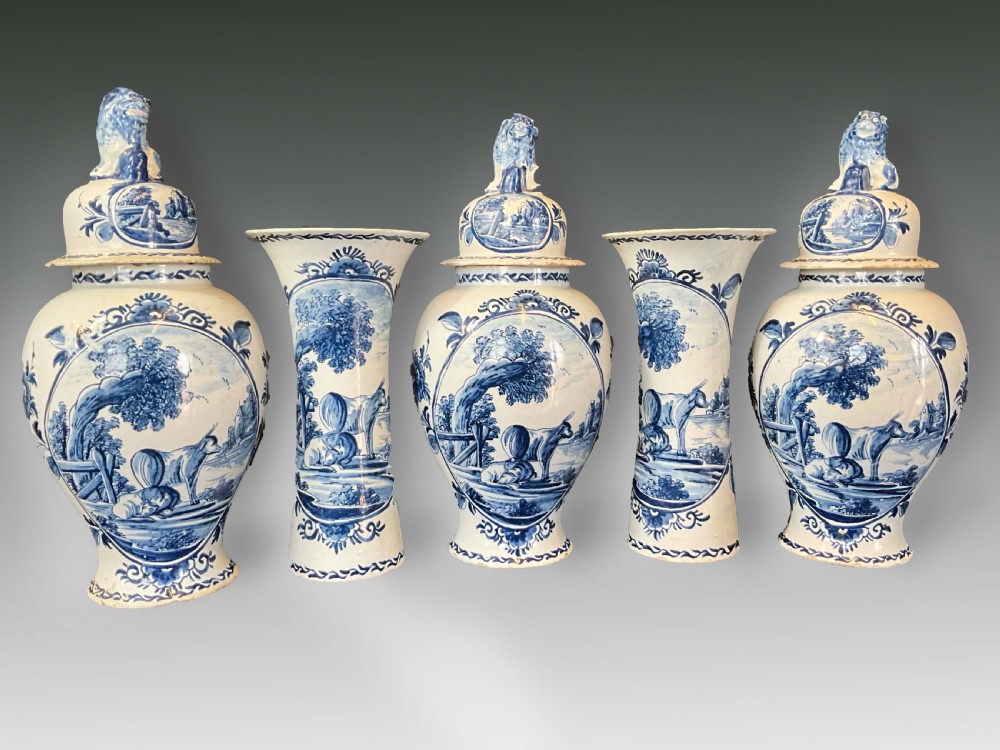 A Garniture of Five Dutch Delft Vases of Considerable Size