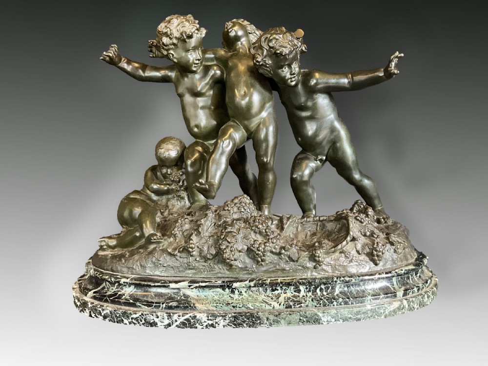 A very big bronze figure group raised on marble. 