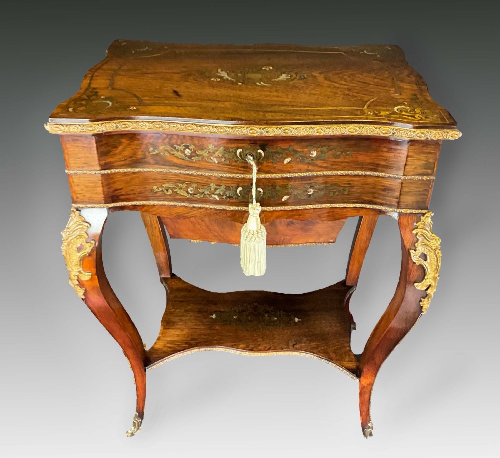 A Rosewood Work Table With Brass And Silvered Inlaid Details