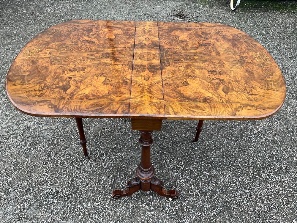 A burr walnut Sutherland table of the highest quality.