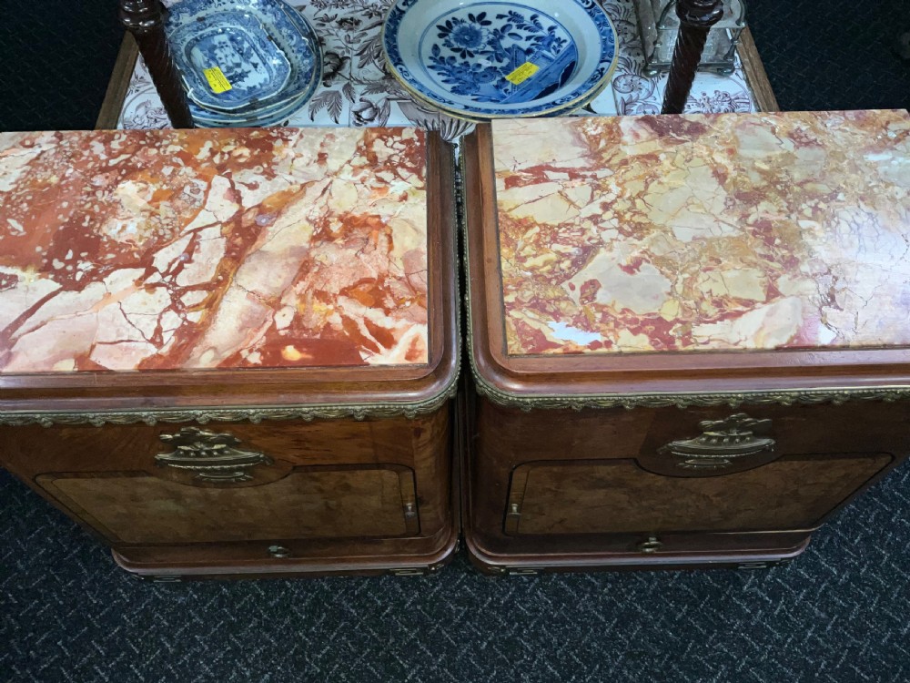 A wonderful pair of French marble top bedside cabinets circa 1890. View VI